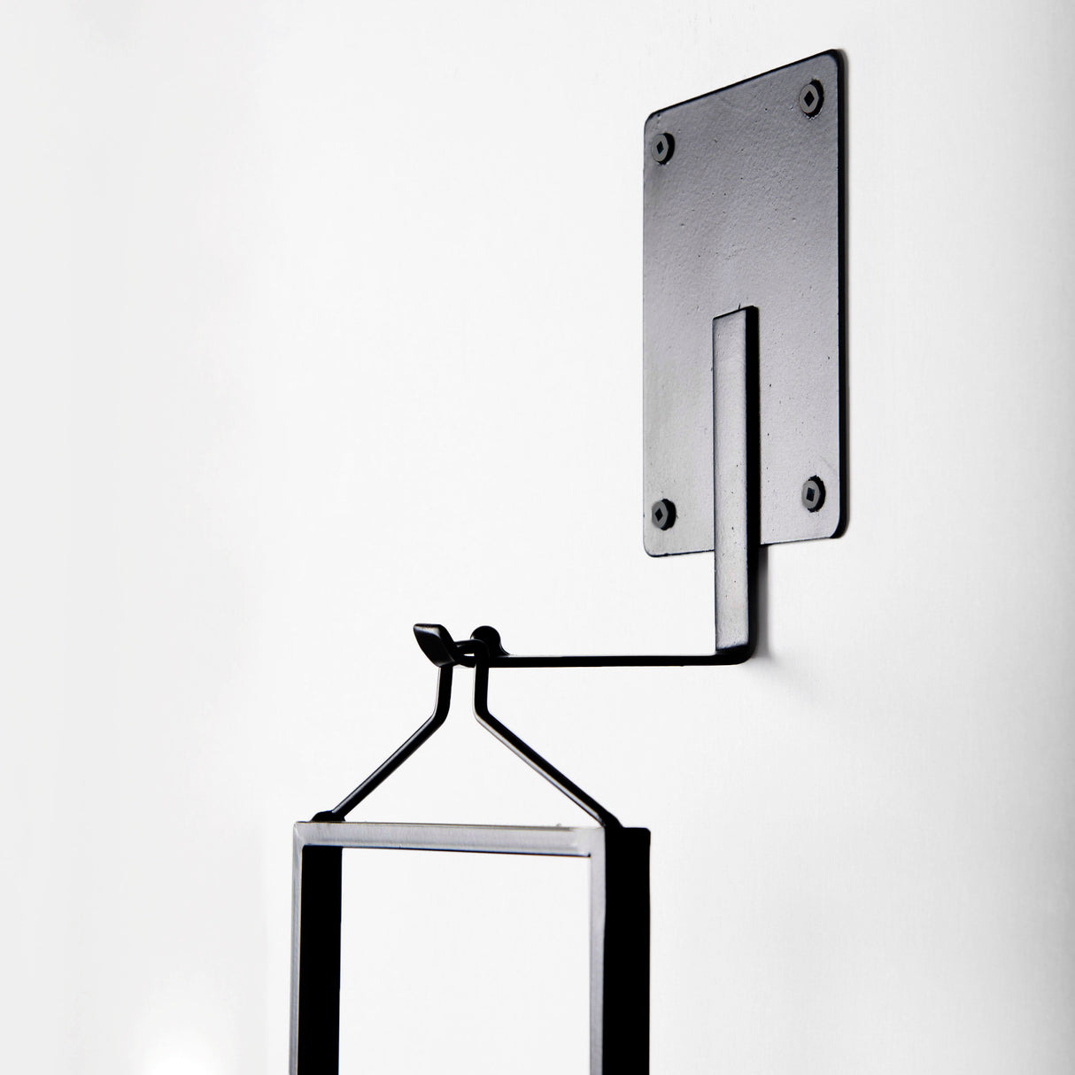 Avram 5.9L x 7.1W x 24.0H Black Metal Frame and Wood Hanging Candle Holder from Mercana - Luna Furniture
