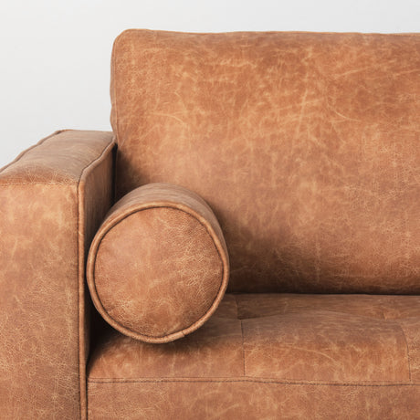 Loretta 88.0L x 36.2W x 33.9H Cognac Brown Faux Leather Three Seater Sofa with Two Bolster Cushions from Mercana - Luna Furniture