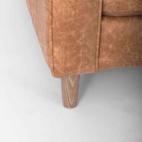 Loretta 88.0L x 36.2W x 33.9H Cognac Brown Faux Leather Three Seater Sofa with Two Bolster Cushions from Mercana - Luna Furniture