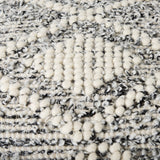 Ekiya 16.0L x 16.0W x 16.0H Black/White Yarn and Wool Patterened Pouf from Mercana - Luna Furniture