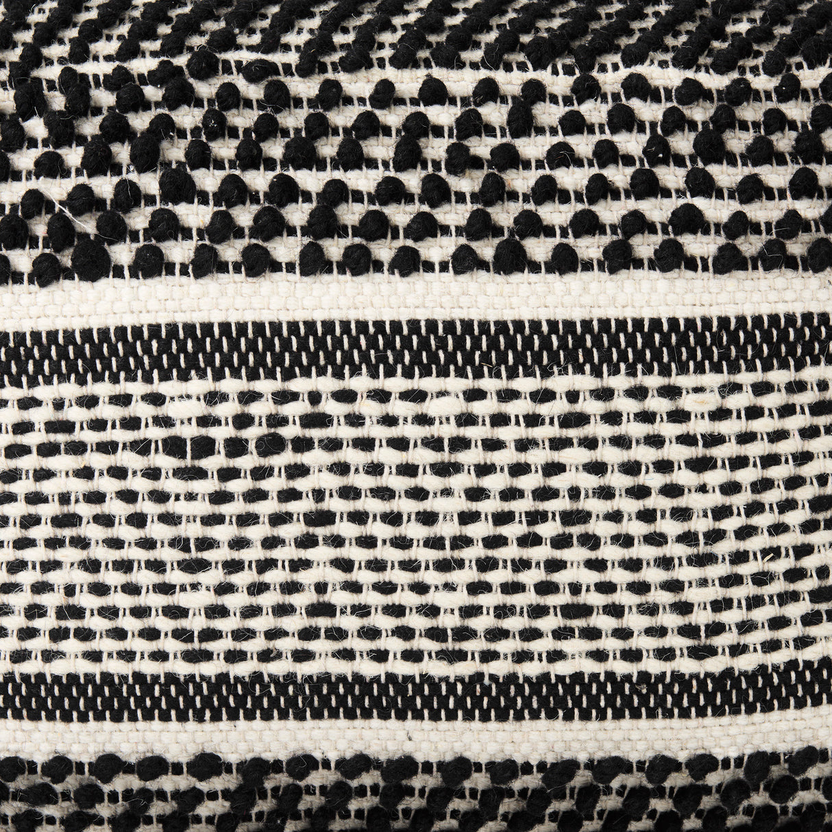 Garima 22.0L x 22.0W x 14.0H Black/White Wool and Cotton Patterned Pouf from Mercana - Luna Furniture