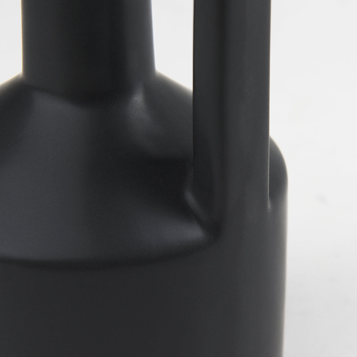 Burton 10.8H Small Matte Black Ceramic Jug Vase from Mercana - Luna Furniture