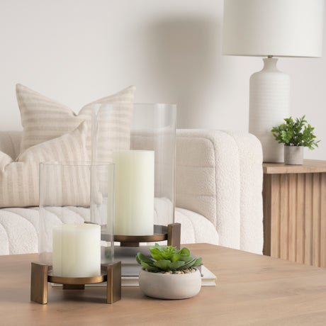 Price Large Antiqued Gold Metal w/ Glass Hurricane Candle Holder from Mercana - Luna Furniture