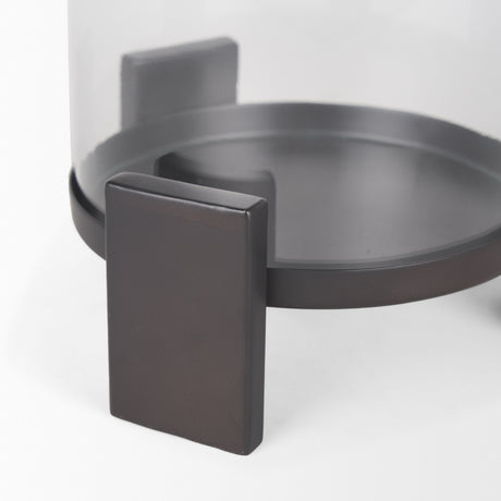 Price Small Matte Black-Brown Metal w/ Glass Hurricane Candle Holder from Mercana - Luna Furniture