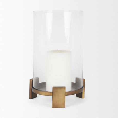 Price Large Antiqued Gold Metal w/ Glass Hurricane Candle Holder from Mercana - Luna Furniture