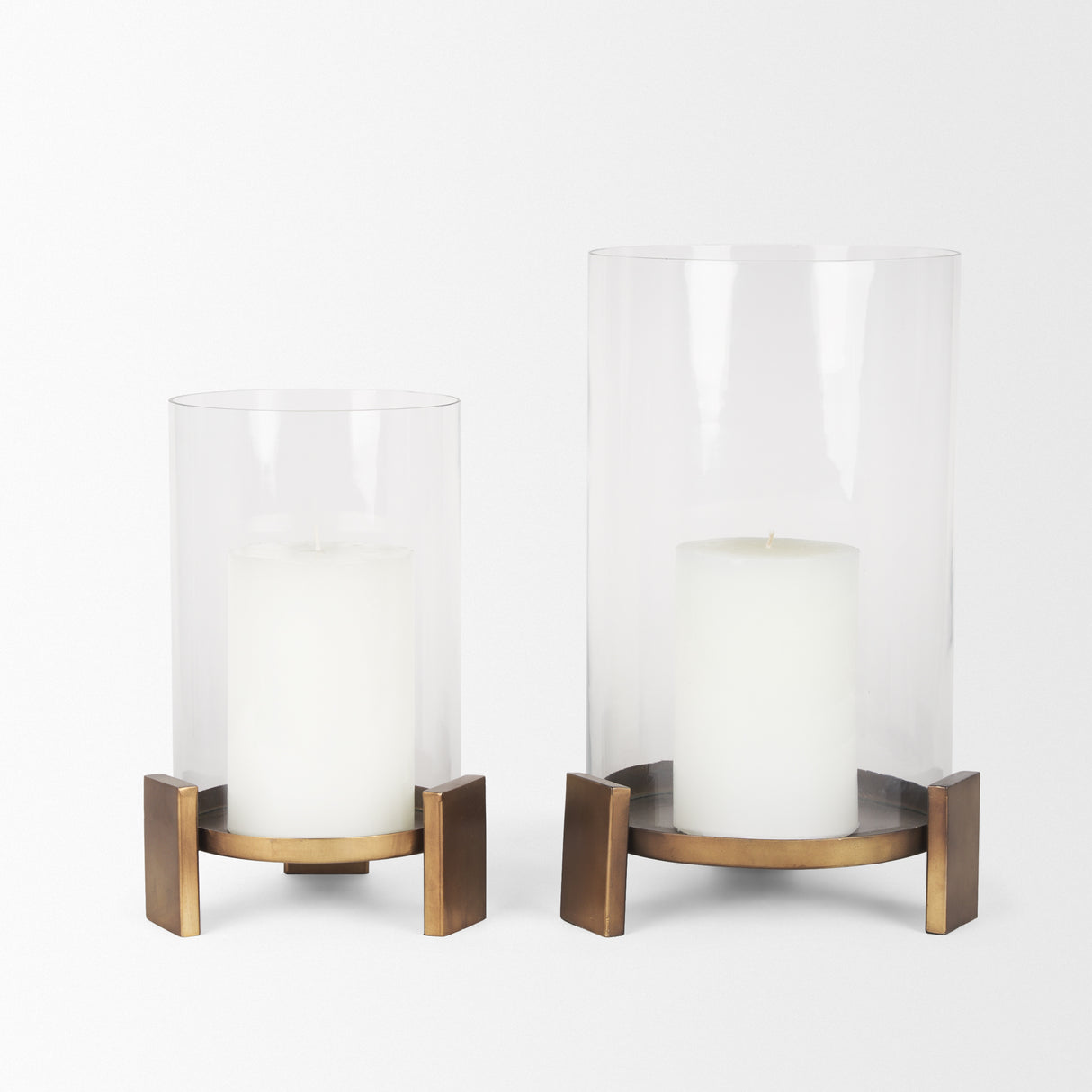 Price Large Antiqued Gold Metal w/ Glass Hurricane Candle Holder from Mercana - Luna Furniture