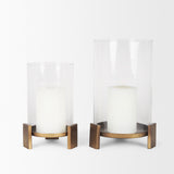 Price Large Antiqued Gold Metal w/ Glass Hurricane Candle Holder from Mercana - Luna Furniture