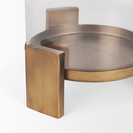 Price Small Antiqued Gold Metal w/ Glass Hurricane Candle Holder from Mercana - Luna Furniture