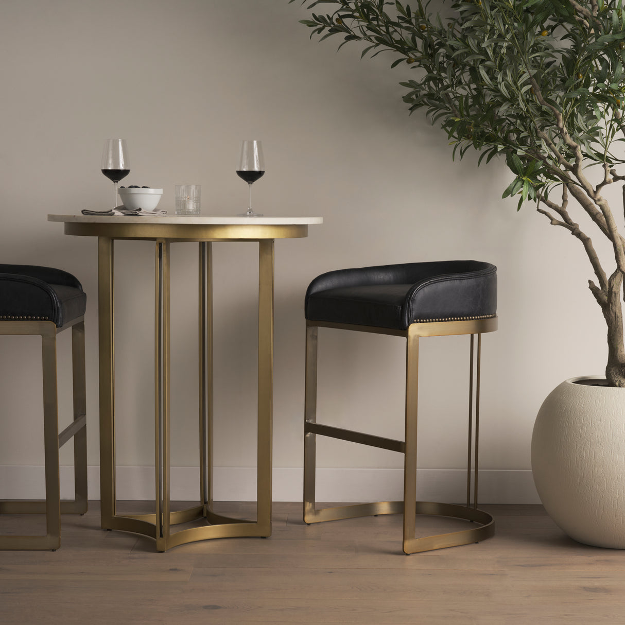 Hollyfield II Black Leather Seat Gold Metal Base Bar Stool from Mercana - Luna Furniture