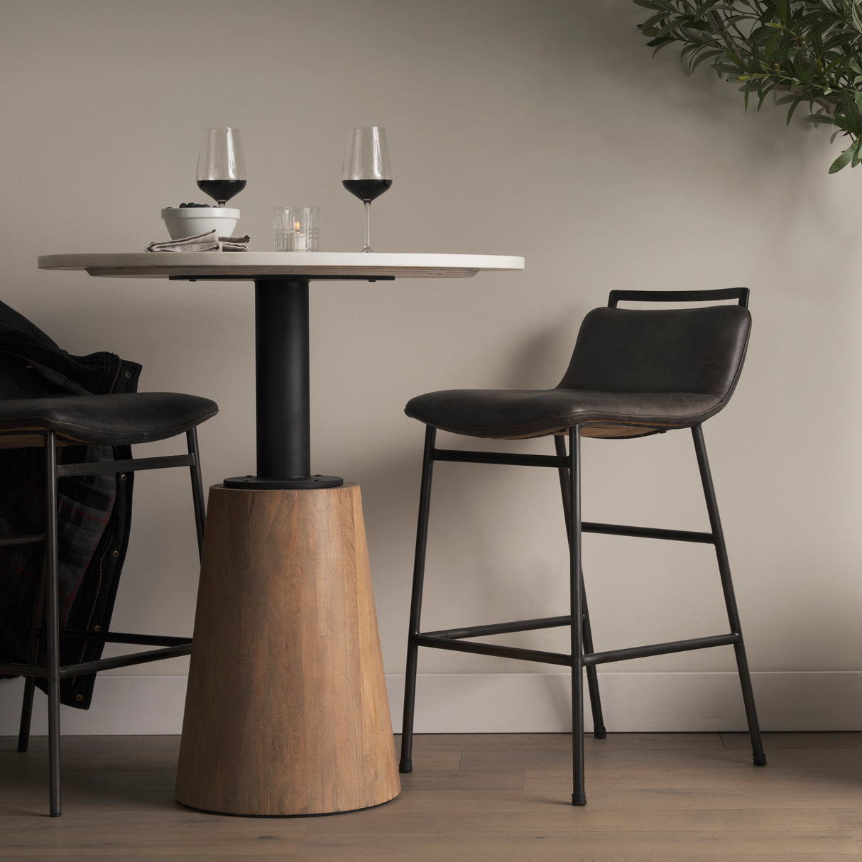 Kavalan 33.5" Total Height Ebony Leather Seat Black Metal Frame Counter Stool from Mercana - Luna Furniture