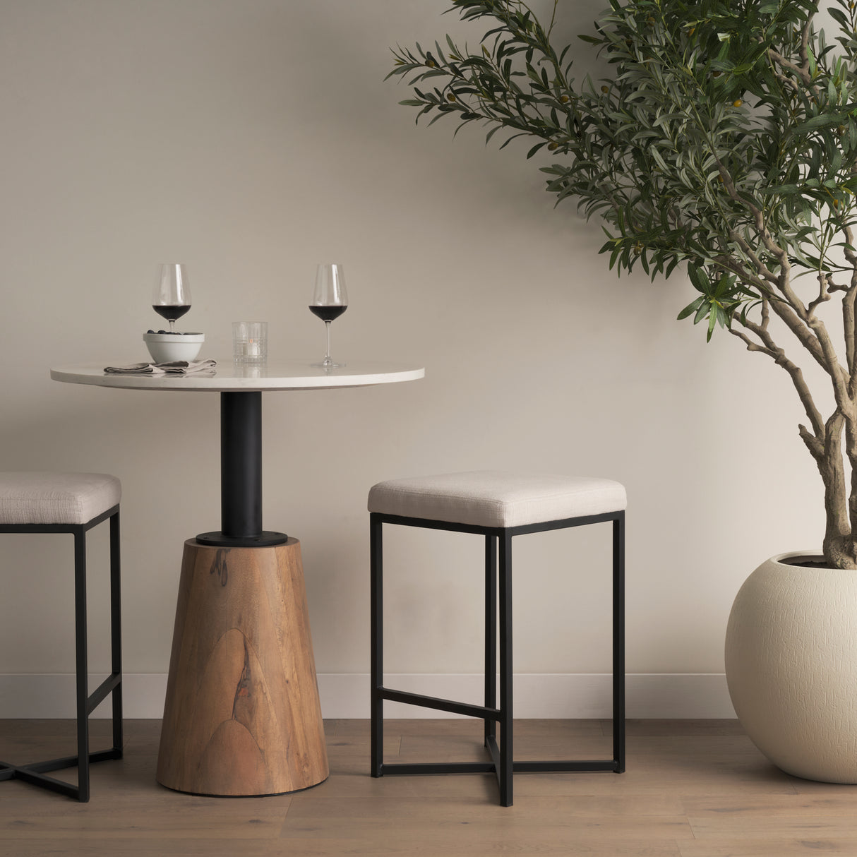 Frodo 26.4H Seat Height White Fabric Seat Black Metal Base Stool from Mercana - Luna Furniture