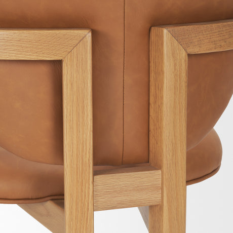 Carlisle Curved Back Tan Leather Tripod Frame Dining Armchair from Mercana - Luna Furniture