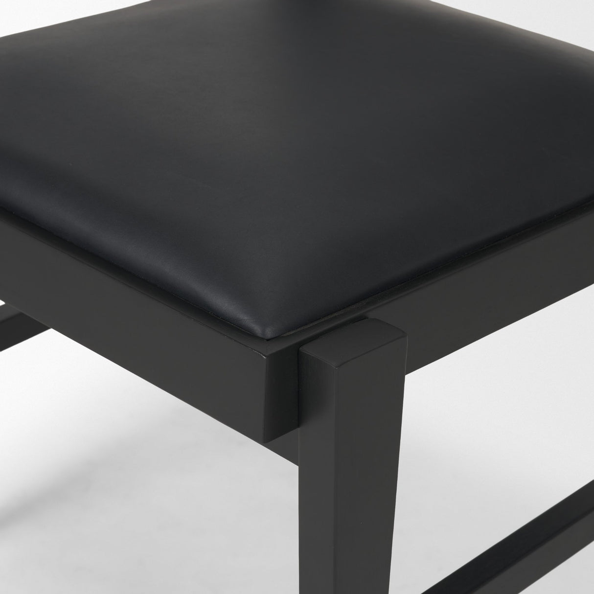 Reid Framed Black Cane Black Leather Dining Chair from Mercana - Luna Furniture