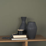 Patine Matte Black Metal Fluted Hourglass Decorative Vase