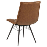 Aiken Saddle dining side chair, side view, contoured seat and black metal legs