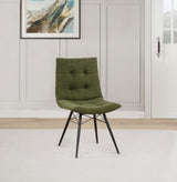 Aiken Forest green dining side chair, button-tufted back and black metal legs, lifestyle view