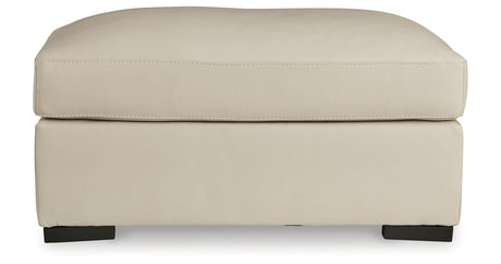 Tresure Trove Almond Ottoman from Ashley - Luna Furniture