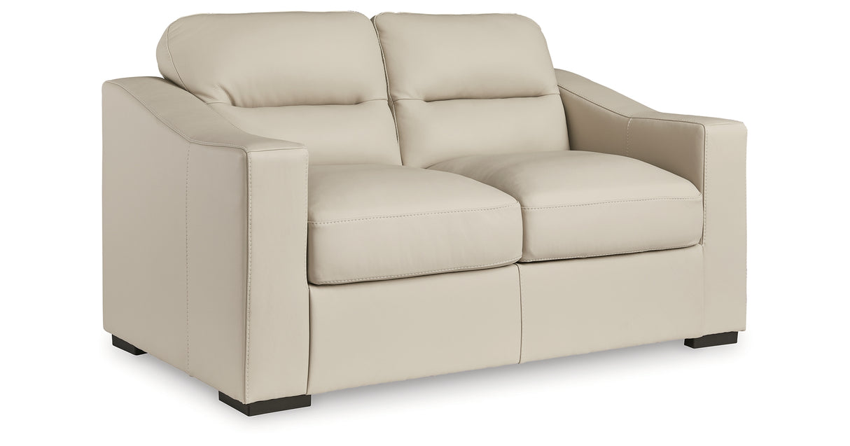 Tresure Trove Almond Loveseat from Ashley Furniture - Luna Furniture