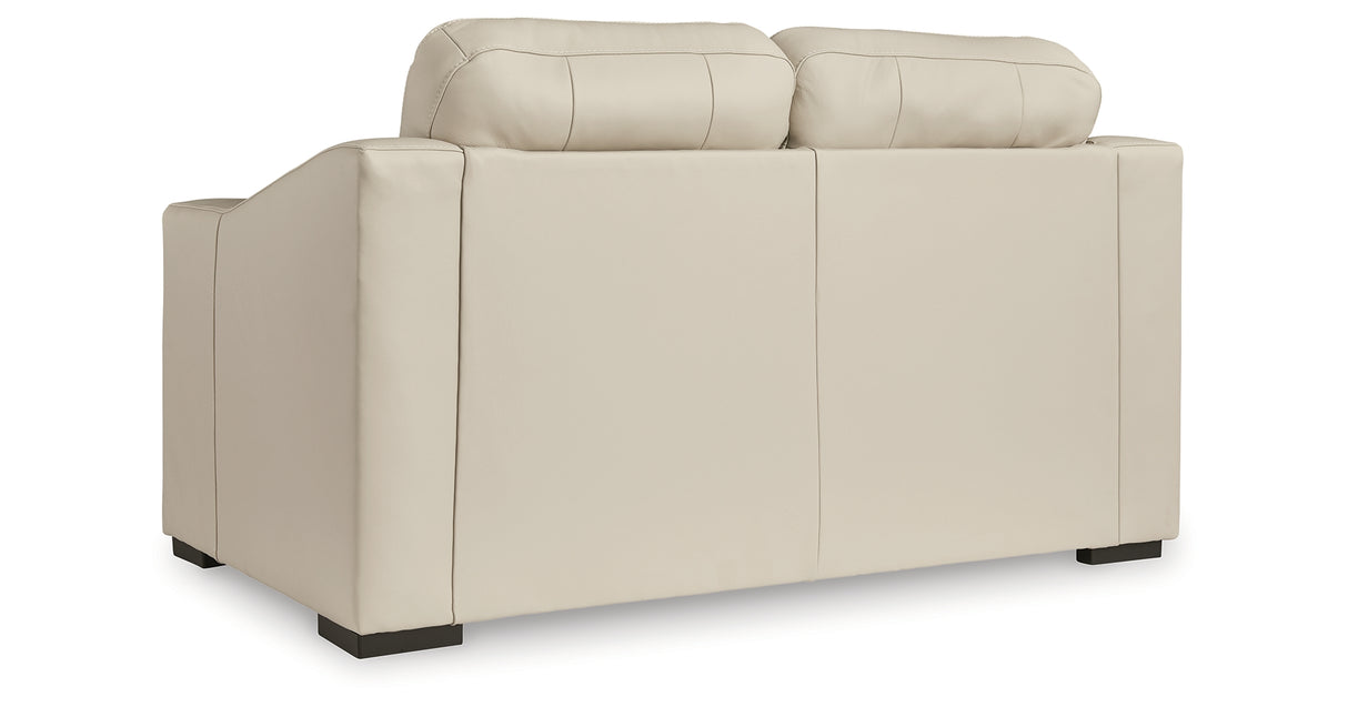 Tresure Trove Almond Loveseat from Ashley Furniture - Luna Furniture