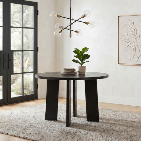 Strouse Black 47-inch Round Wood Dining Room Table from Coaster - Luna Furniture