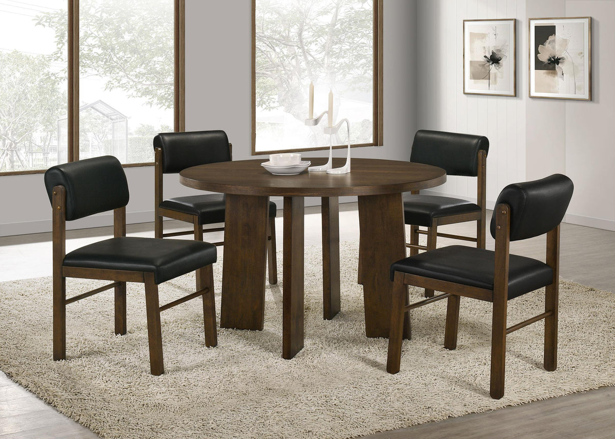 Strouse Walnut 5-piece dining set with round table and black upholstered chairs, lifestyle view