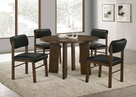 Strouse Walnut 5-piece dining set with round table and black upholstered chairs, lifestyle view