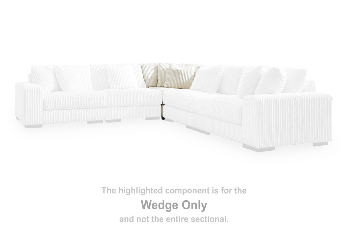 Lindyn Ivory Wedge from Ashley - Luna Furniture