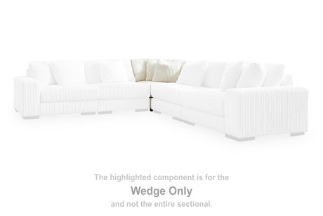 Lindyn Ivory Wedge from Ashley Furniture - Luna Furniture