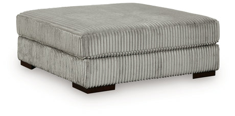 Lindyn Fog 4-Piece Sectional and Ottoman from Ashley Furniture - Luna Furniture