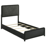 Cavelle Black twin bed, upholstered-looking headboard and low footboard, front three-quarter view