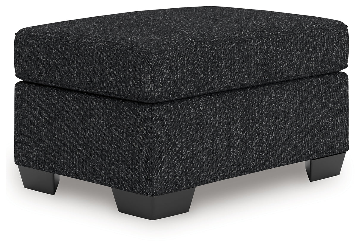 Jasmine Peaks Coal Ottoman from Ashley Furniture - Luna Furniture