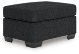 Jasmine Peaks Coal Ottoman from Ashley Furniture - Luna Furniture