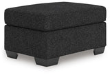 Jasmine Peaks Coal Ottoman from Ashley Furniture - Luna Furniture