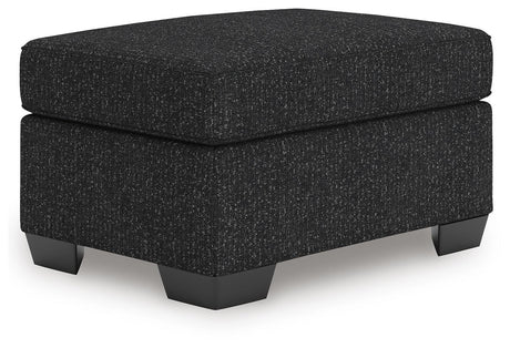 Jasmine Peaks Coal Ottoman from Ashley Furniture - Luna Furniture