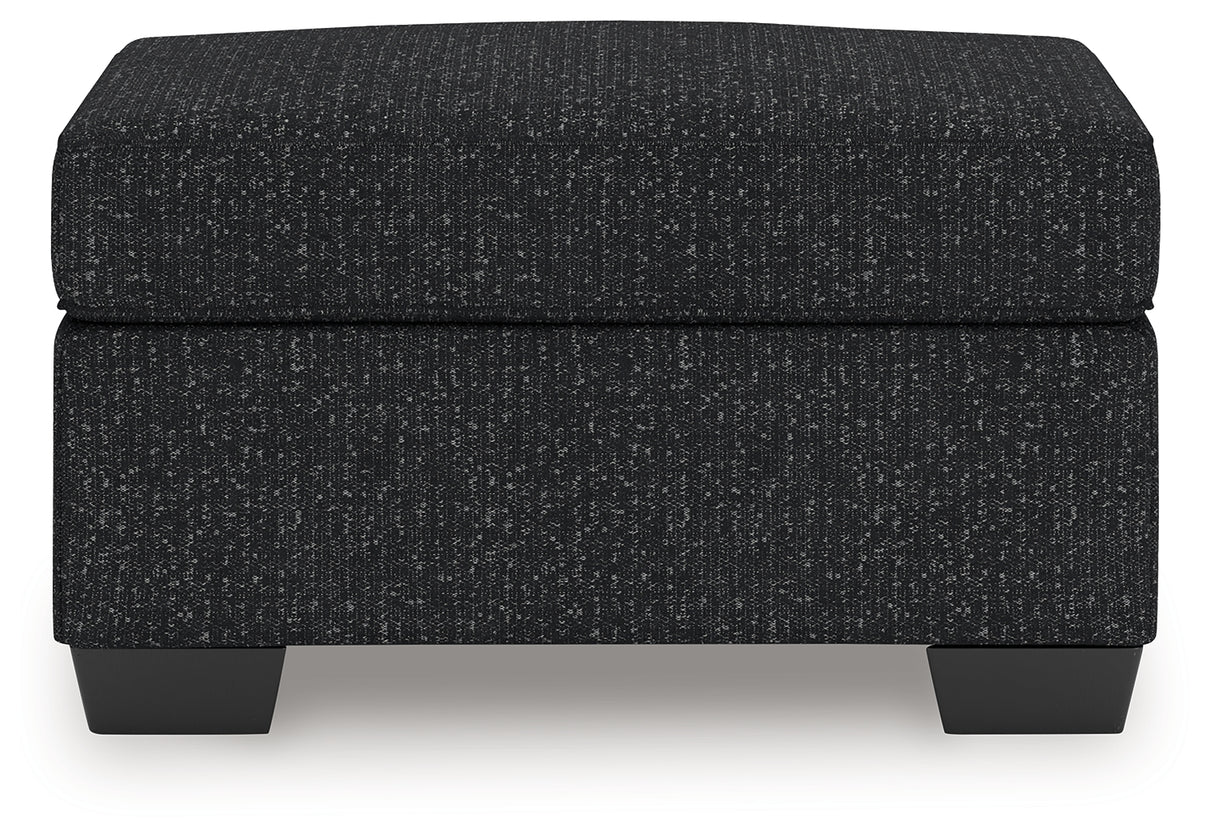 Jasmine Peaks Coal Ottoman from Ashley Furniture - Luna Furniture