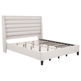 Leslie Beige California King Platform Bed, angled full view with slat base and wingback headboard