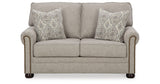 Gaelon Sofa, Loveseat, Chair and Ottoman in Dune from Ashley Furniture - Luna Furniture