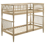 Abram Almond Twin Over Twin bunk bed, open spindle frame, three-quarter view