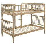 Abram Almond Twin Over Twin bunk bed, angled side view, open spindle rails