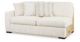 Chessington Cream 2-Piece Sectional and Ottoman from Ashley Furniture - Luna Furniture