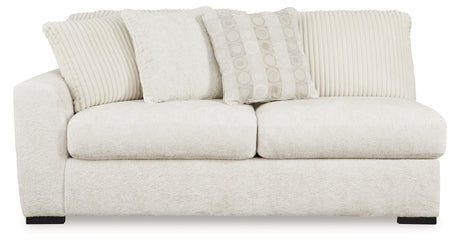 Chessington Cream 2-Piece Sectional and Ottoman from Ashley Furniture - Luna Furniture