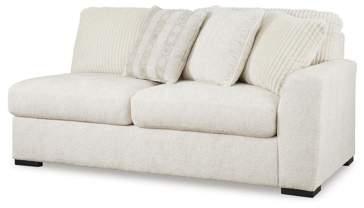 Chessington 3-Piece Sectional and Ottoman from Ashley Furniture - Luna Furniture