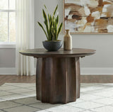 Cayenne Walnut cocktail coffee table, styled living-room view with plant and vase
