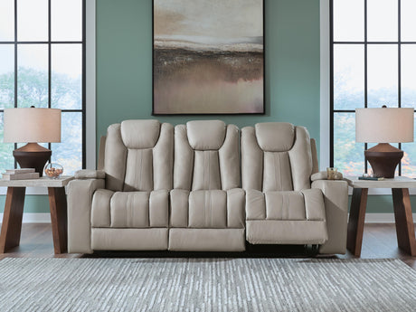 Elevate Edges Coin Reclining Sofa with Drop Down Table from Ashley - Luna Furniture