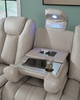 Elevate Edges Coin Reclining Sofa with Drop Down Table from Ashley Furniture - Luna Furniture
