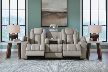 Elevate Edges Coin Reclining Sofa with Drop Down Table from Ashley - Luna Furniture