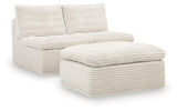 Fannin Ivory Armless Chair with Ottoman from Ashley - Luna Furniture