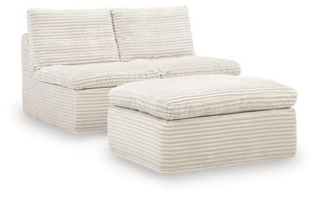 Fannin Ivory Armless Chair with Ottoman from Ashley - Luna Furniture