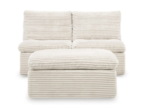 Fannin Ivory Armless Chair with Ottoman from Ashley - Luna Furniture