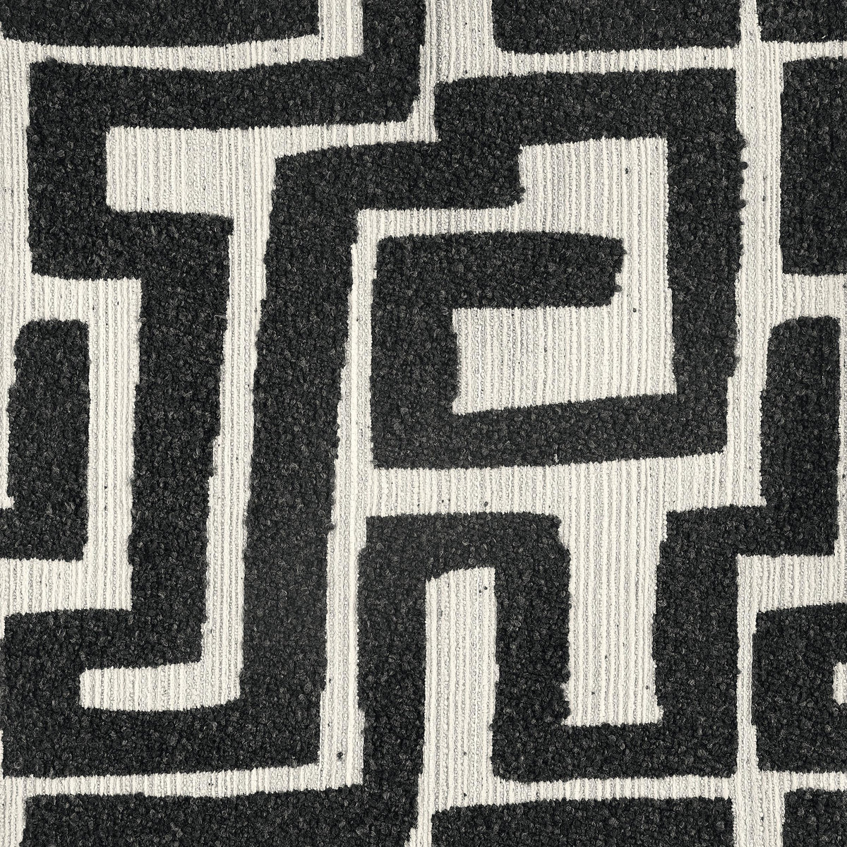 Eimer Black accent chair, side profile, bold black-and-ivory jacquard upholstery